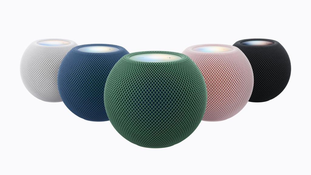 HomePod mini 2 i hvitt, blått, grønt, rosa og midnatt ved siden av hverandre