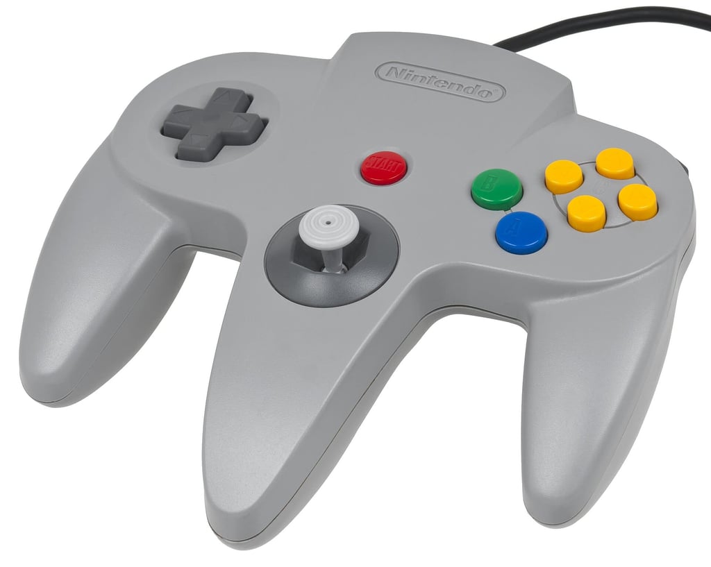 Grå Nintendo 64-kontroller med tre håndtak