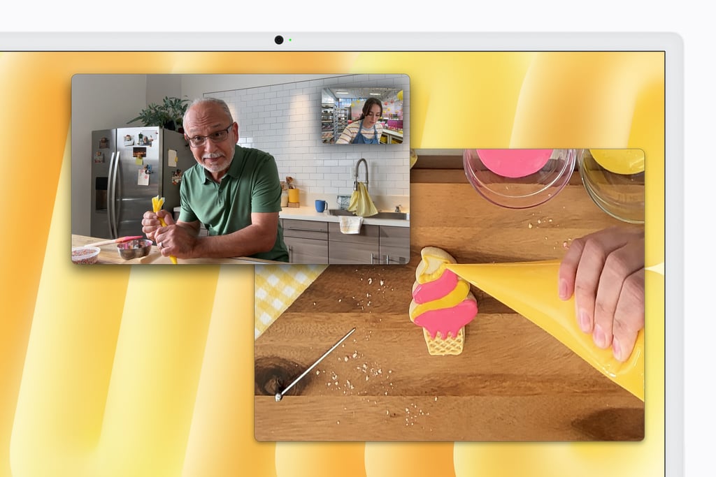 FaceTime-samtale på en gul iMac med Desk View som viser bordet