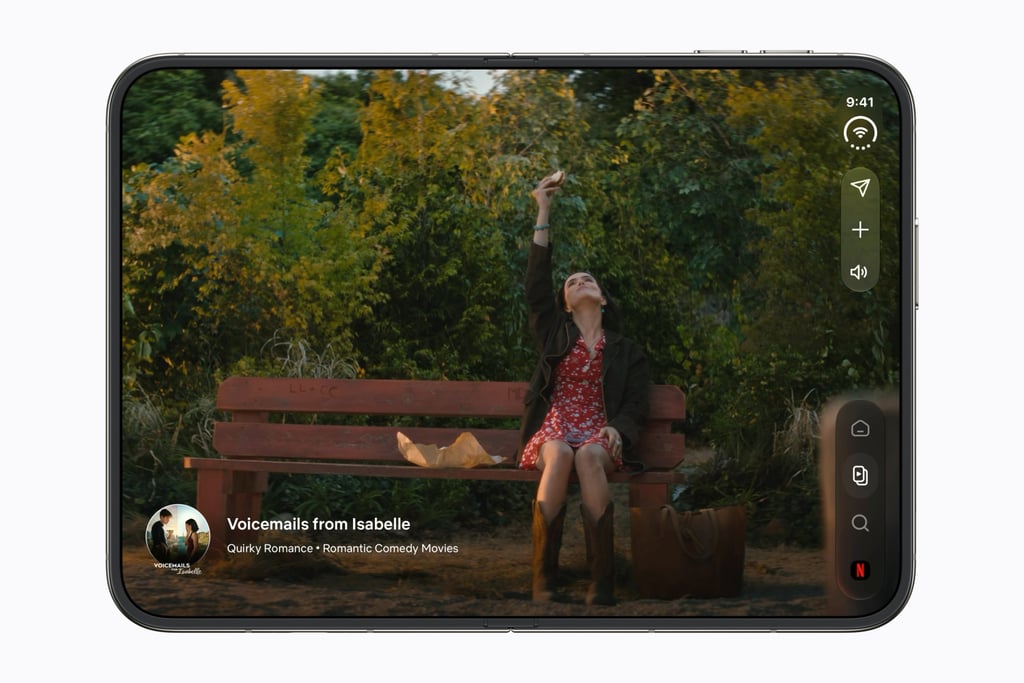 Netflix-appen vist på den store skjermen til en åpen iPhone Duo